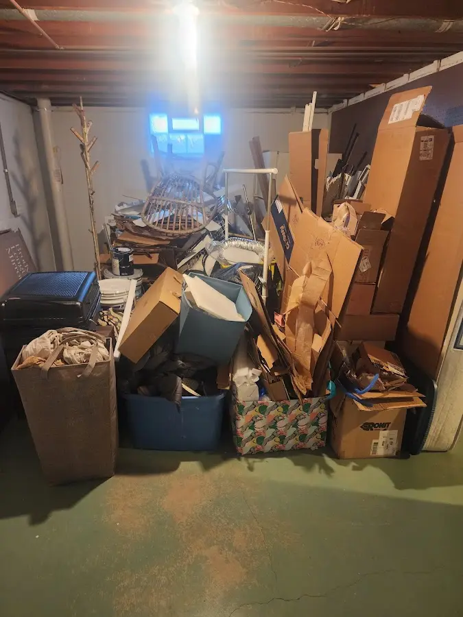 Roll-off dumpster container at job site for 4 Yard Dumpster Rental in Center Point